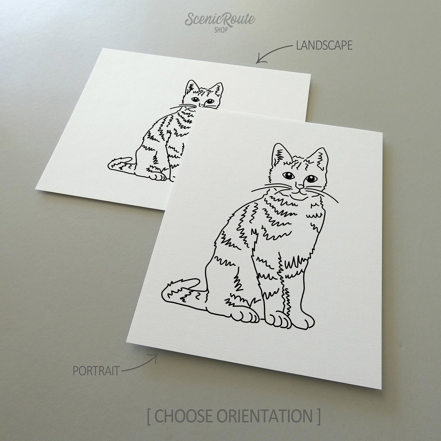 Two line art drawings of a Tabby Cat on white linen paper with a gray background.  The pieces are shown in portrait and landscape orientation for the available art print options.