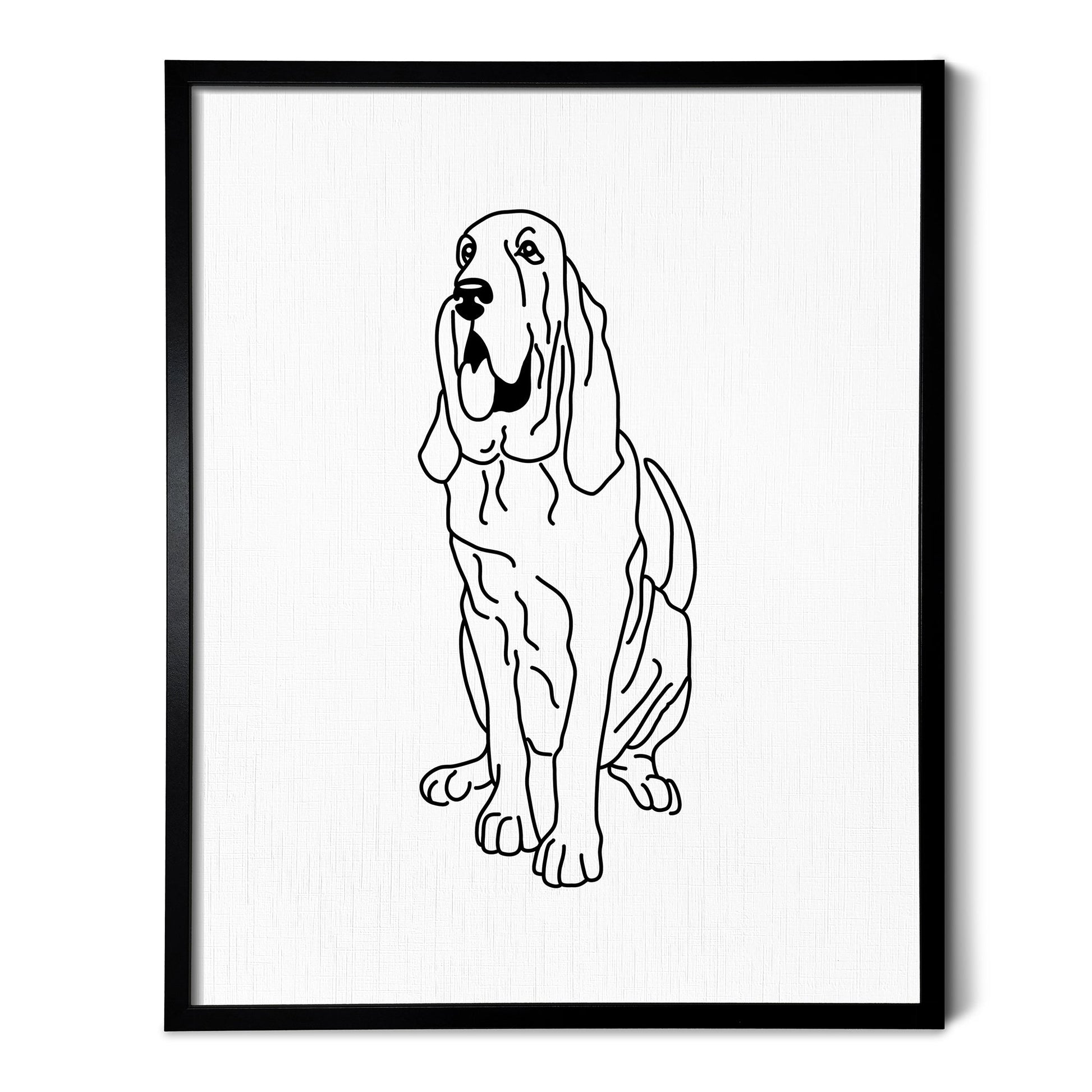 A drawing of a Bloodhound dog on white linen paper in a thin black picture frame