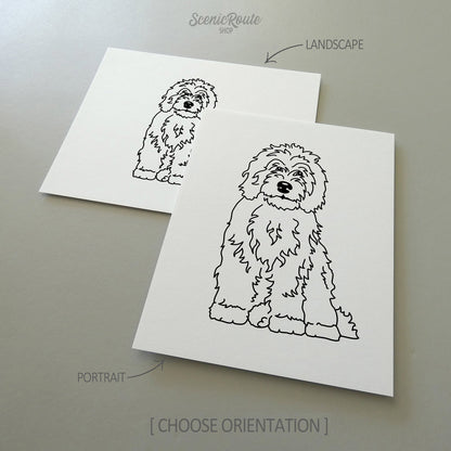 Two line art drawings of a Sheepadoodle dog on white linen paper with a gray background.  The pieces are shown in portrait and landscape orientation for the available art print options.