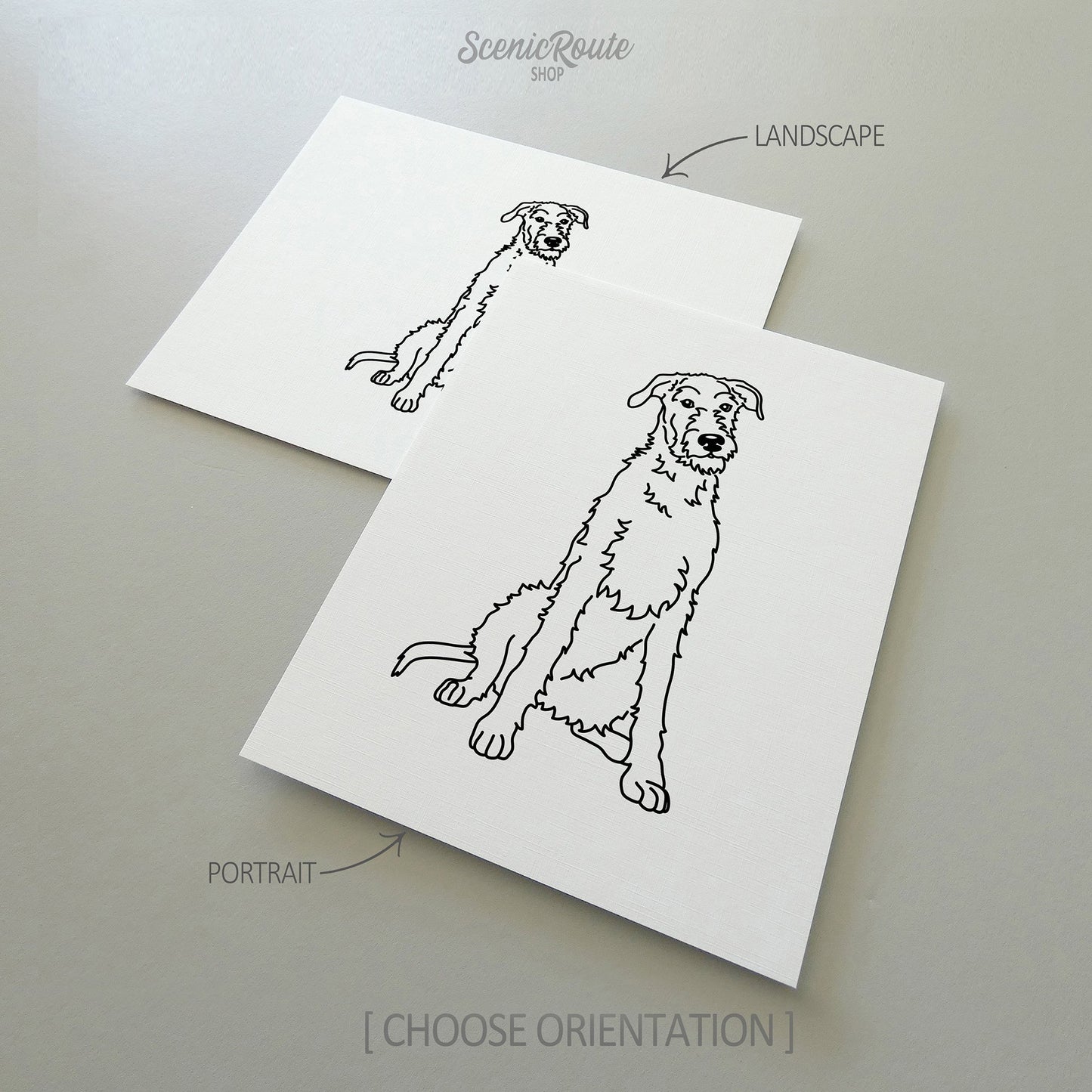 Two line art drawings of a Wolfhound dog on white linen paper with a gray background.  The pieces are shown in portrait and landscape orientation for the available art print options.