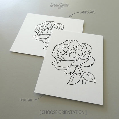 Two line art drawings of a Peony Flower on white linen paper with a gray background.  The pieces are shown in portrait and landscape orientation for the available art print options.