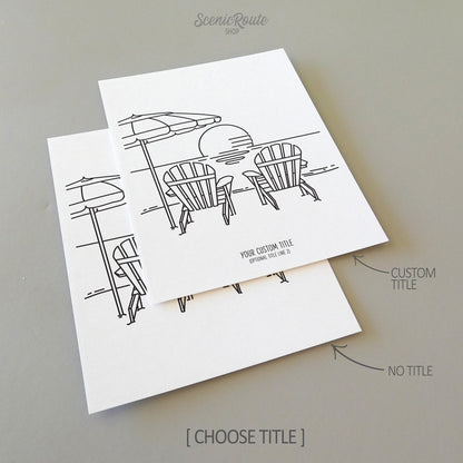 Two line art drawings of Two Adirondack Beach Chairs and an Umbrella on the beach with the setting sun on white linen paper with a gray background.  The pieces are shown with “No Title” and “Custom Title” options for the available art print options.