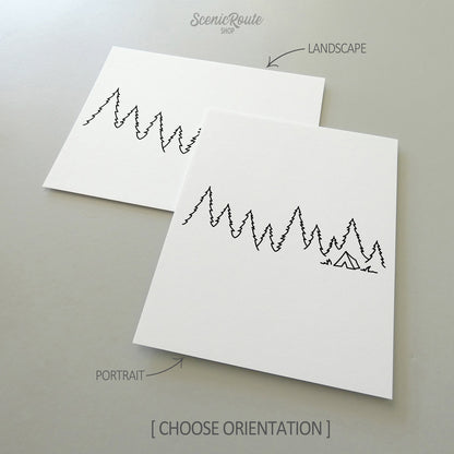 Two line art drawings of Camping on white linen paper with a gray background.  The pieces are shown in portrait and landscape orientation for the available art print options.