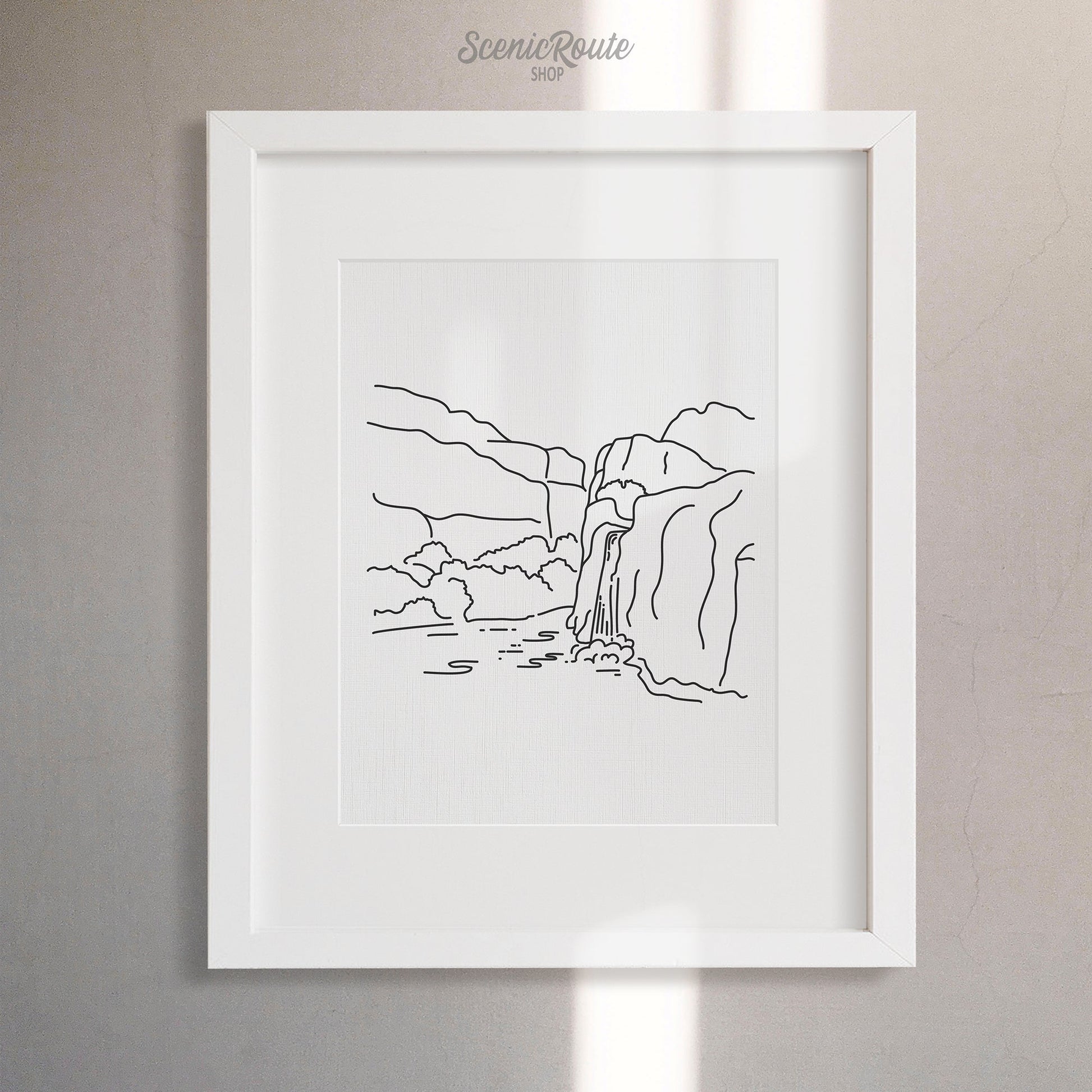 A framed line art drawing of Havasu Falls