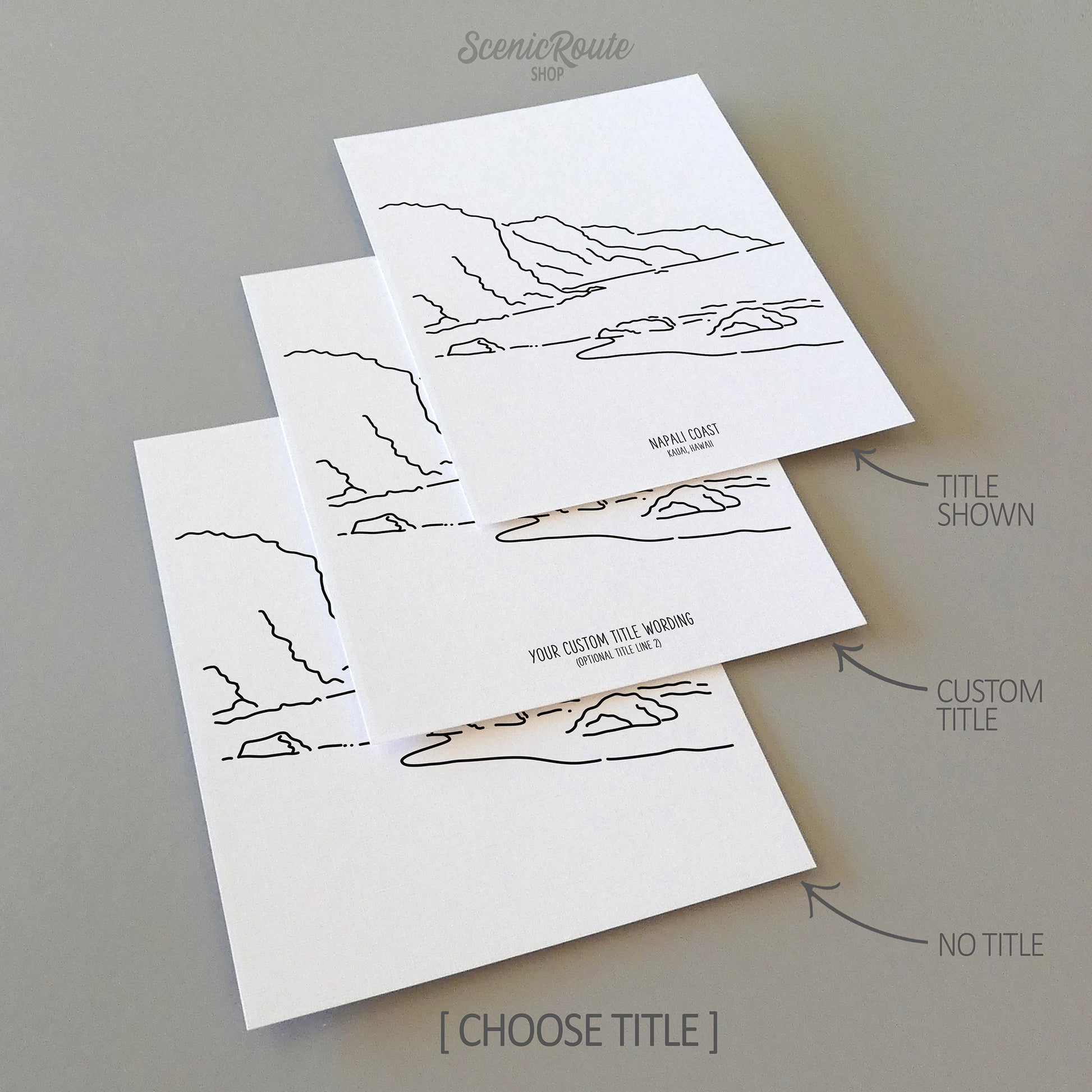 Three line art drawings of the NaPali Coast in Kauai Hawaii on white linen paper with a gray background.  The pieces are shown with title options that can be chosen and personalized.
