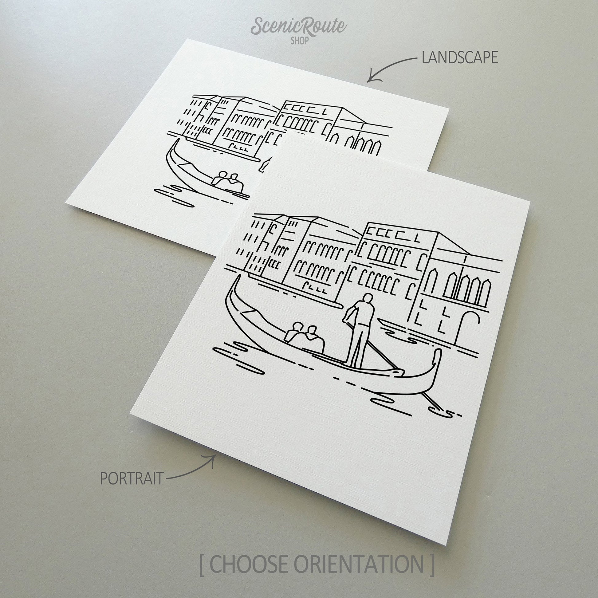 Two line art drawings of the Grand Canal on white linen paper with a gray background.  The pieces are shown in portrait and landscape orientation for the available art print options.