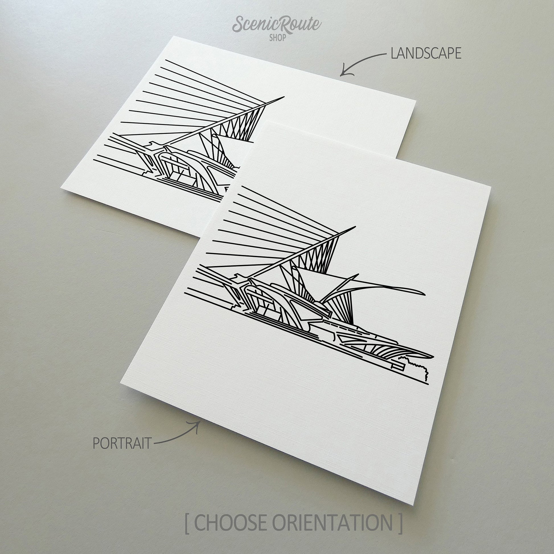Two line art drawings of the Milwaukee Art Museum on white linen paper with a gray background.  The pieces are shown in portrait and landscape orientation for the available art print options.