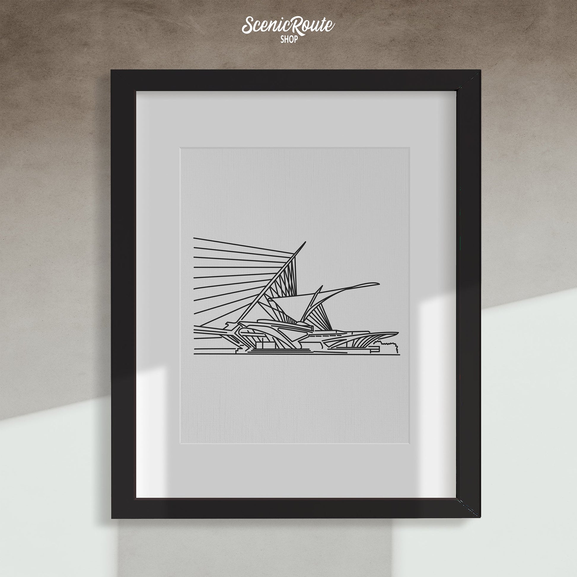 A framed line art drawing of the Milwaukee Art Museum
