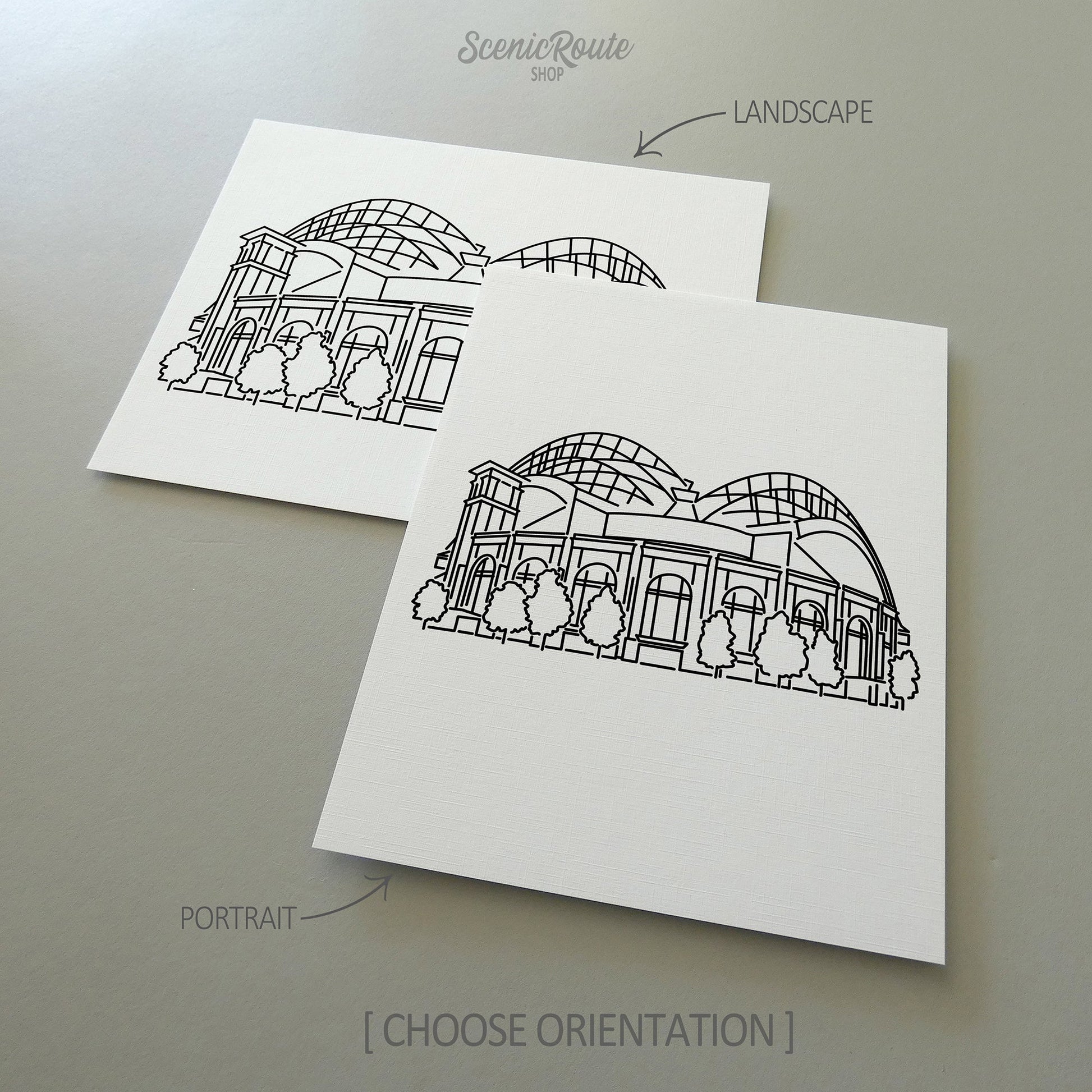 Two line art drawings of the Brewers Ballpark on white linen paper with a gray background.  The pieces are shown in portrait and landscape orientation for the available art print options.
