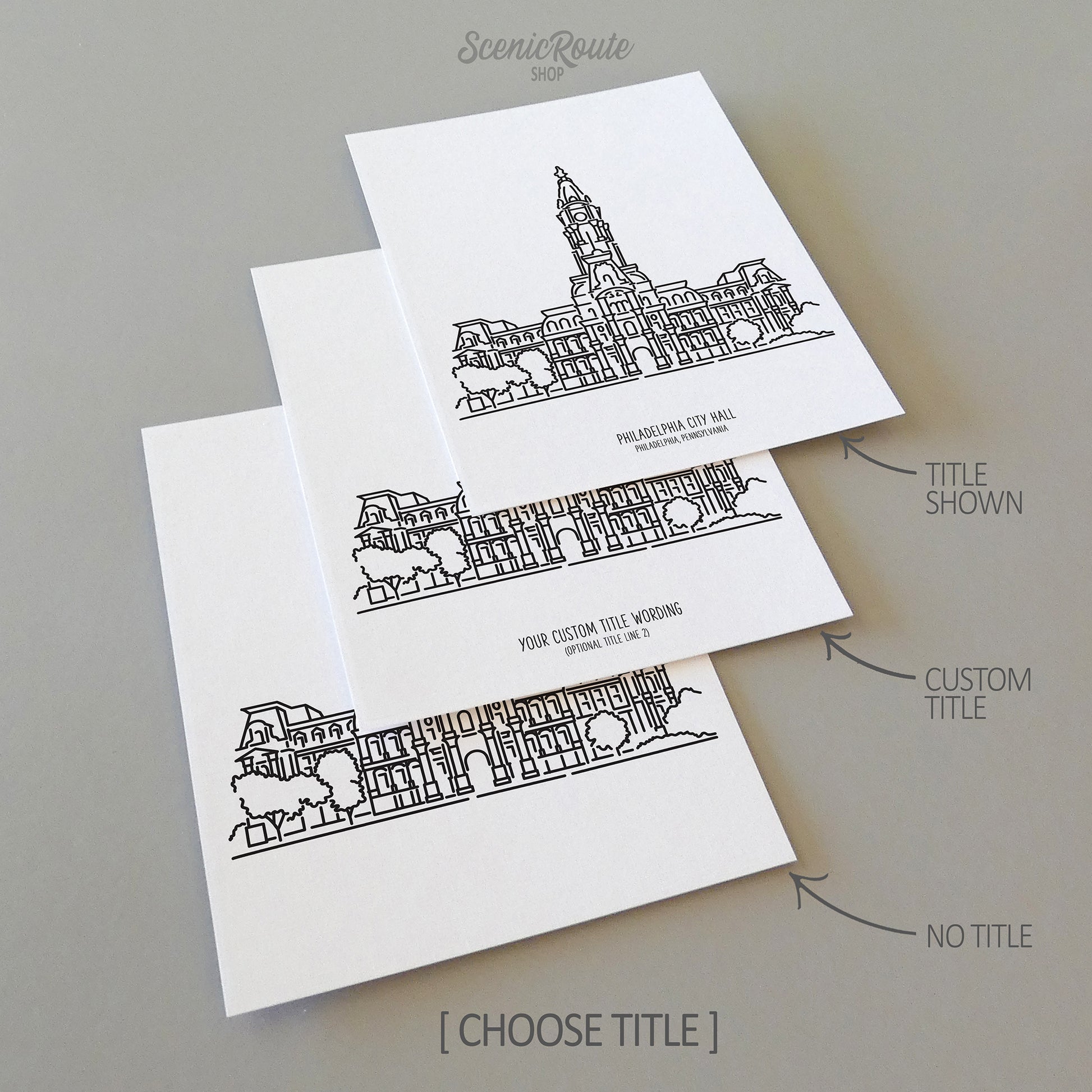 Three line art drawings of Philadelphia City Hall in Pennsylvania on white linen paper with a gray background.  The pieces are shown with title options that can be chosen and personalized.