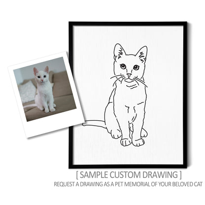 A custom line art drawing of a cat on white linen paper in a thin black picture frame