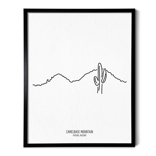 A line art drawing of Camelback Mountain in Phoenix Arizona on white linen paper in a thin black picture frame