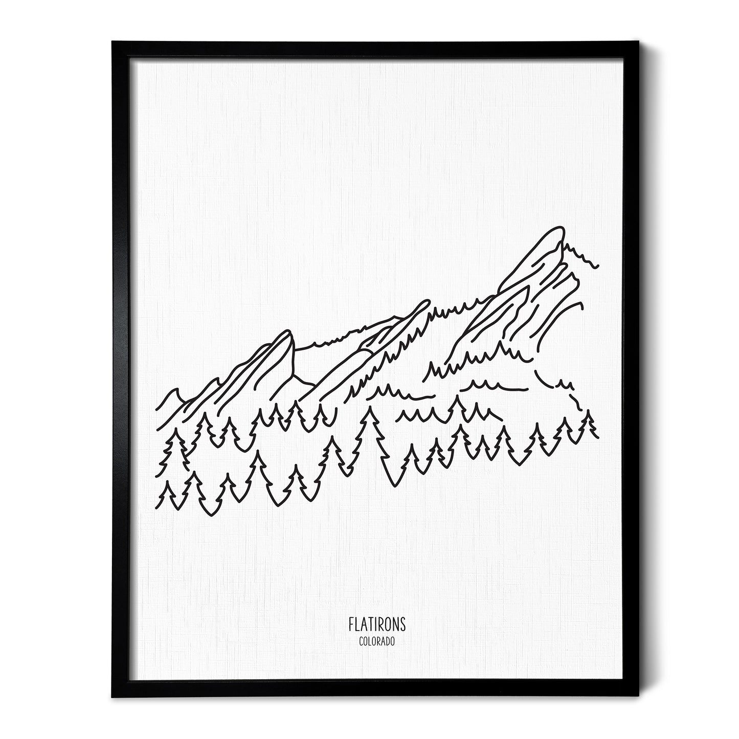 A line art drawing of the Flatiron Mountains in Colorado on white linen paper in a thin black picture frame
