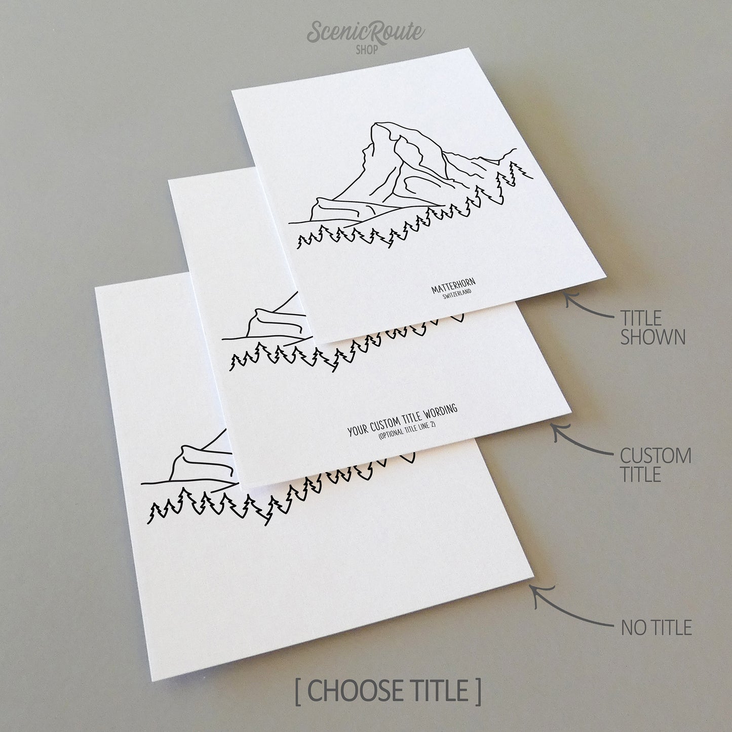 Three line art drawings of the Matterhorn Mountain in Switzerland on white linen paper with a gray background.  The pieces are shown with title options that can be chosen and personalized.