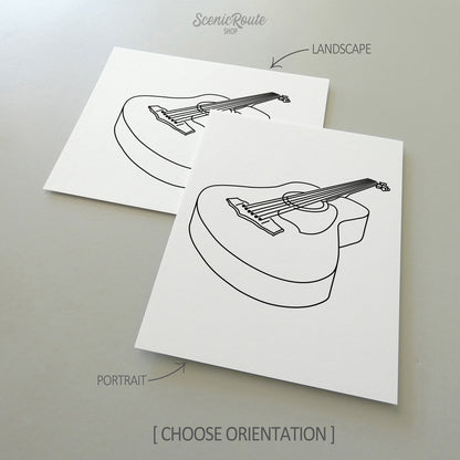 Two line art drawings of a Guitar on white linen paper with a gray background.  The pieces are shown in portrait and landscape orientation for the available art print options.