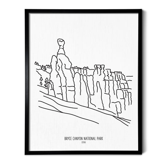 A line art drawing of Bryce Canyon National Park on white linen paper in a thin black picture frame