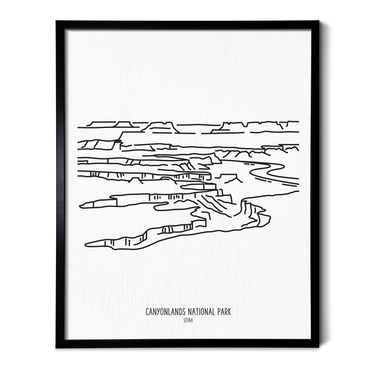 A line art drawing of Canyonlands National Park on white linen paper in a thin black picture frame