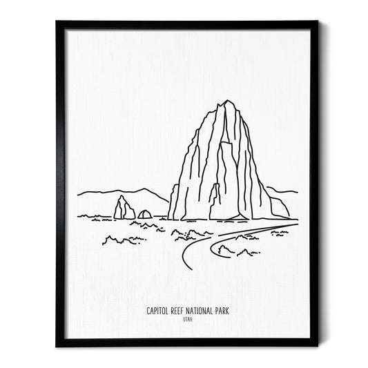 A line art drawing of Capitol Reef National Park on white linen paper in a thin black picture frame