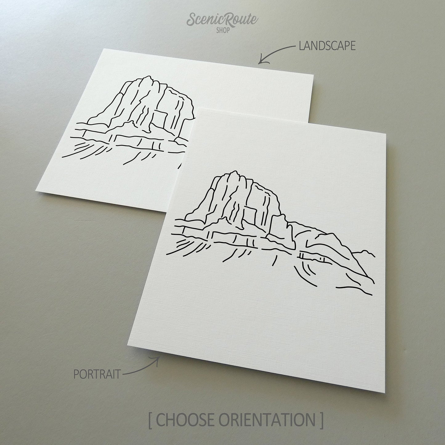 Two line art drawings of Guadalupe National Park on white linen paper with a gray background.  The pieces are shown in portrait and landscape orientation for the available art print options.