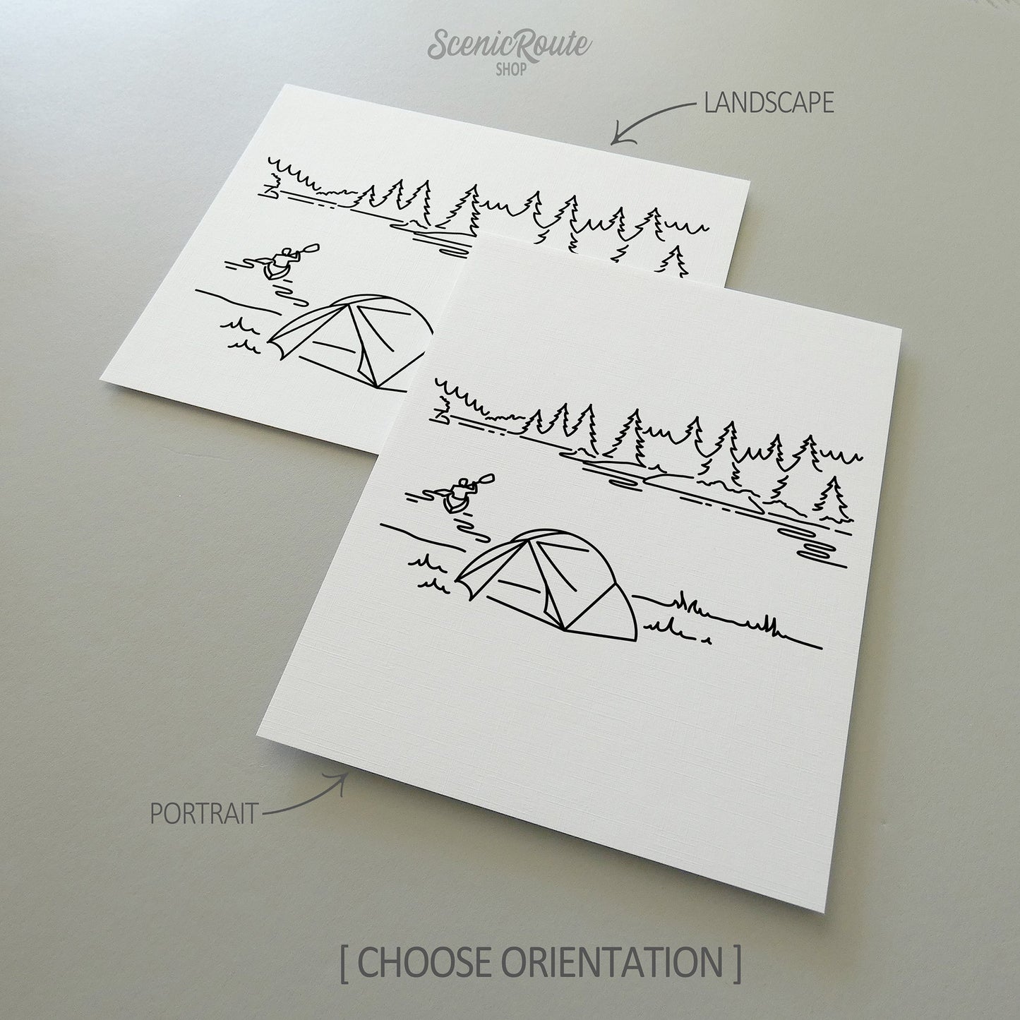 Two line art drawings of Voyageurs National Park on white linen paper with a gray background.  The pieces are shown in portrait and landscape orientation for the available art print options.