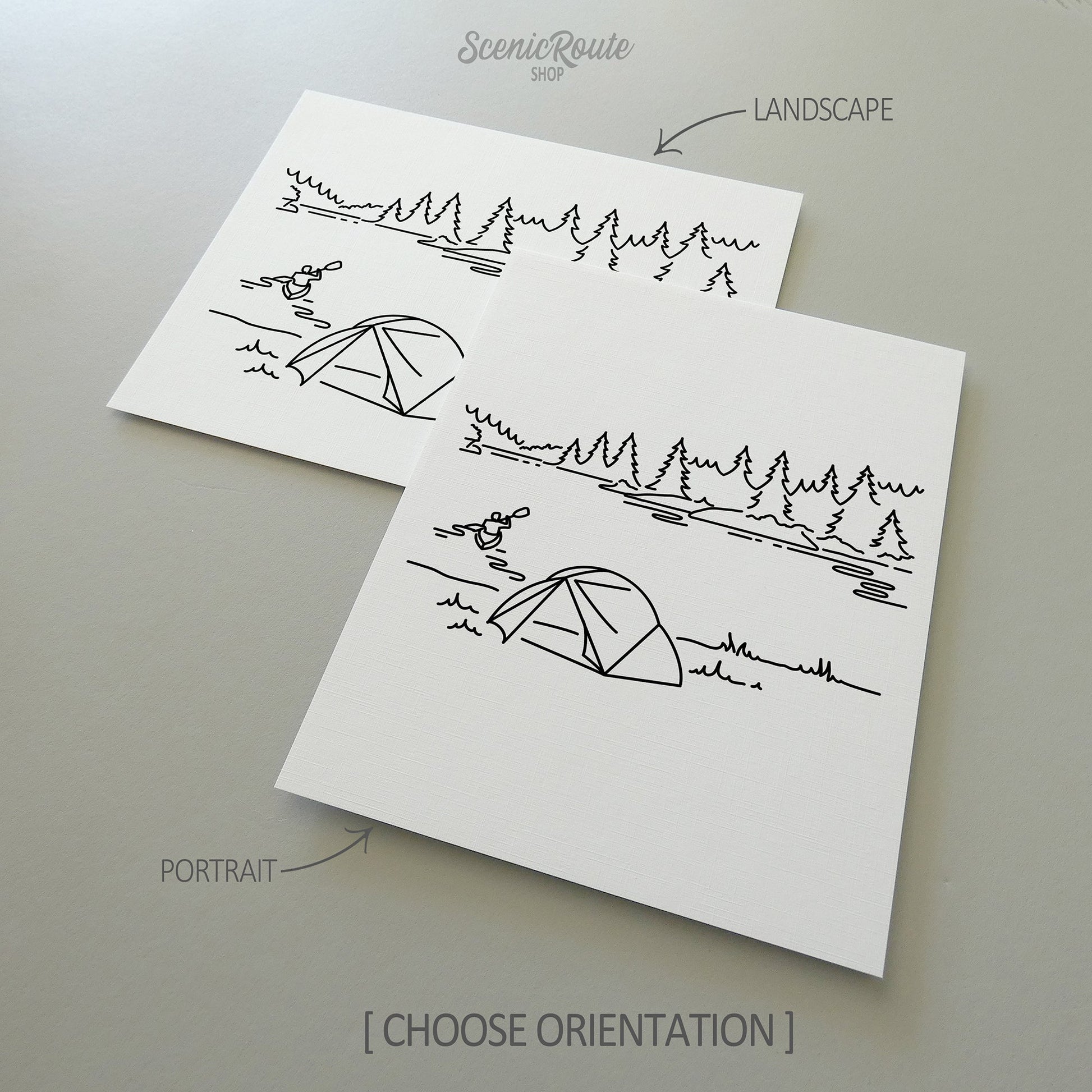 Two line art drawings of Voyageurs National Park on white linen paper with a gray background.  The pieces are shown in portrait and landscape orientation for the available art print options.