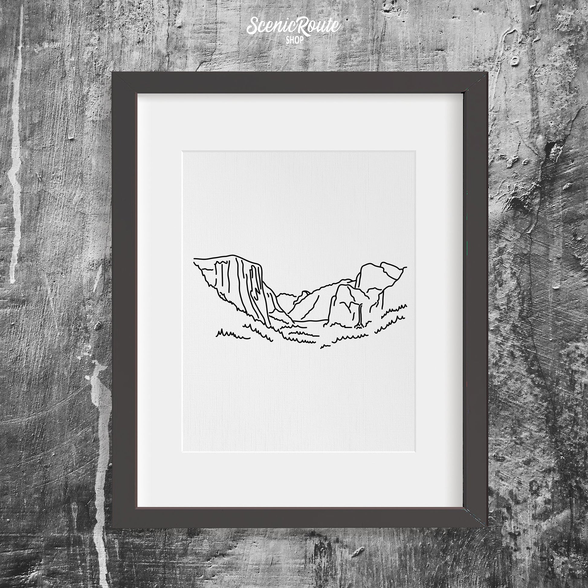 A framed line art drawing of Yosemite National Park