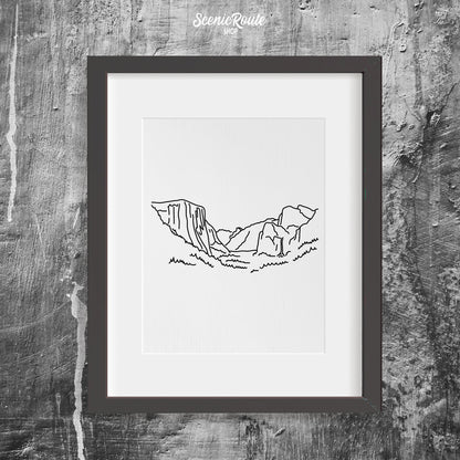 A framed line art drawing of Yosemite National Park