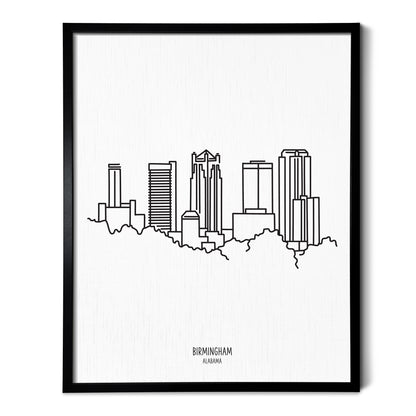 A line art drawing of the Birmingham Alabama Skyline on white linen paper in a thin black picture frame