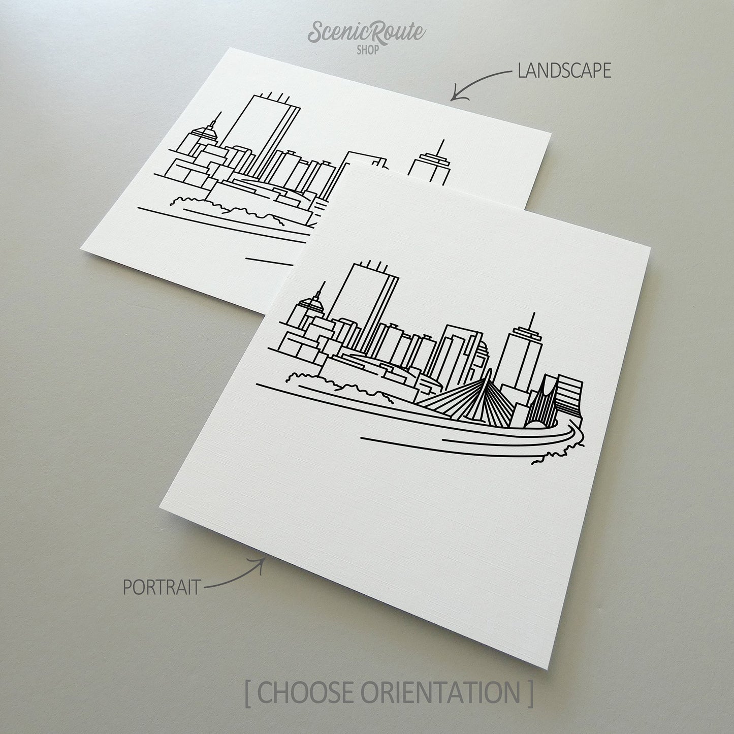 Two line art drawings of the Boston Skyline on white linen paper with a gray background.  The pieces are shown in portrait and landscape orientation for the available art print options.