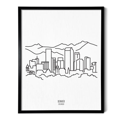 A line art drawing of the Denver Colorado Skyline on white linen paper in a thin black picture frame