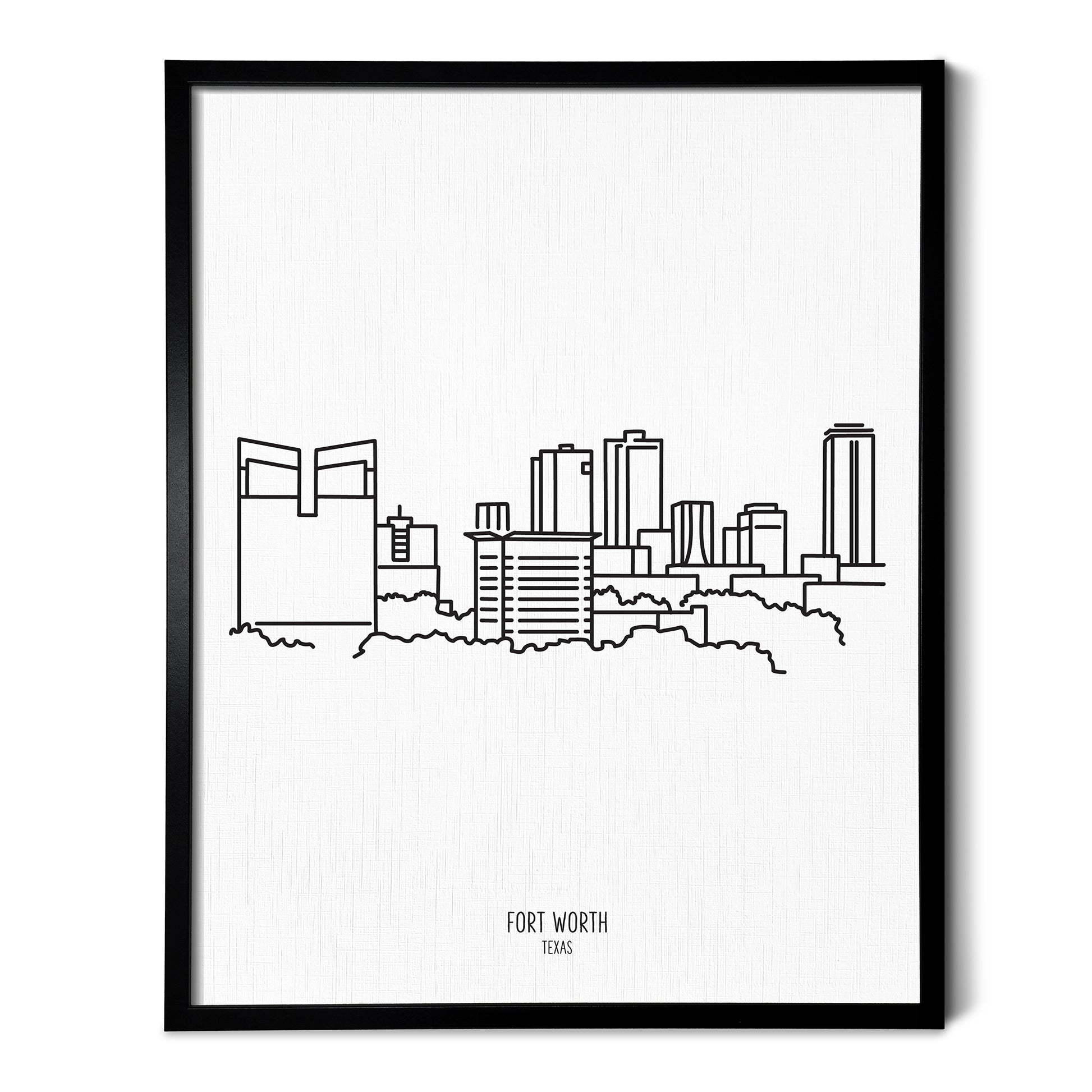 A line art drawing of the Fort Worth Texas Skyline on white linen paper in a thin black picture frame