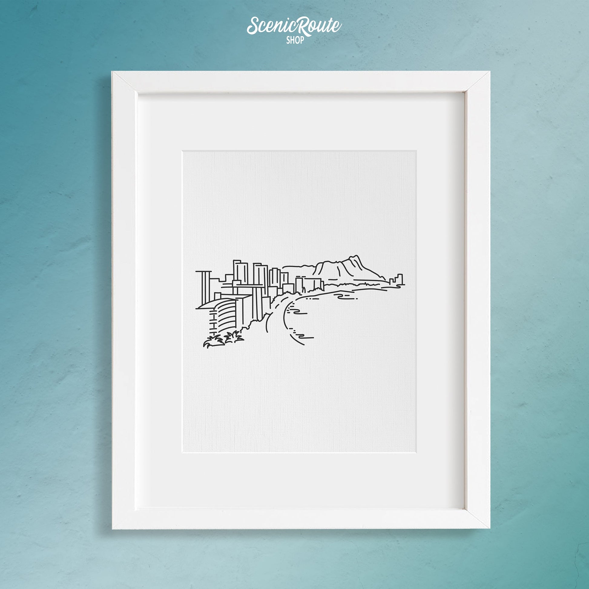A framed line art drawing of the Honolulu Skyline on a blue wall