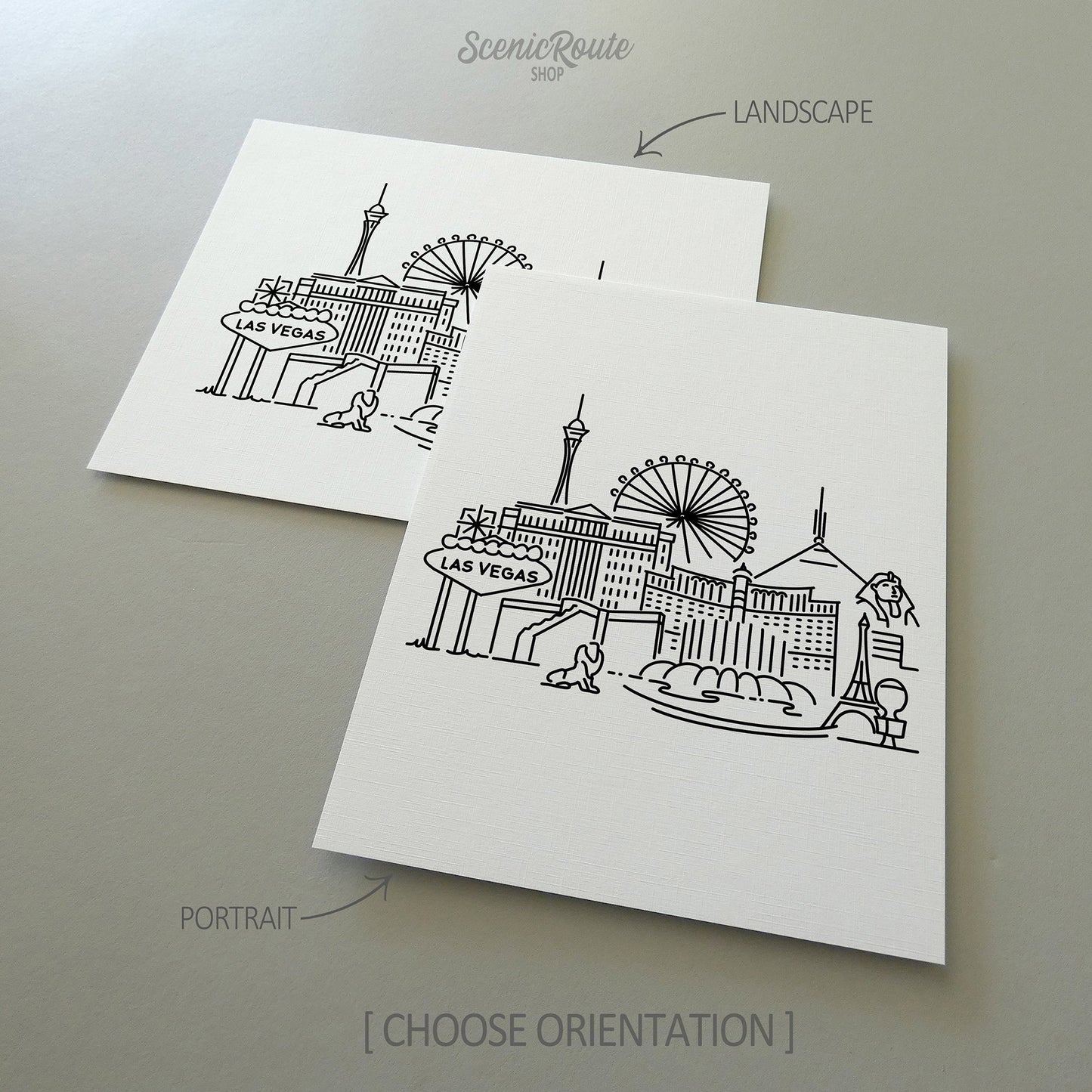 Two line art drawings of the Las Vegas Skyline on white linen paper with a gray background.  The pieces are shown in portrait and landscape orientation for the available art print options.