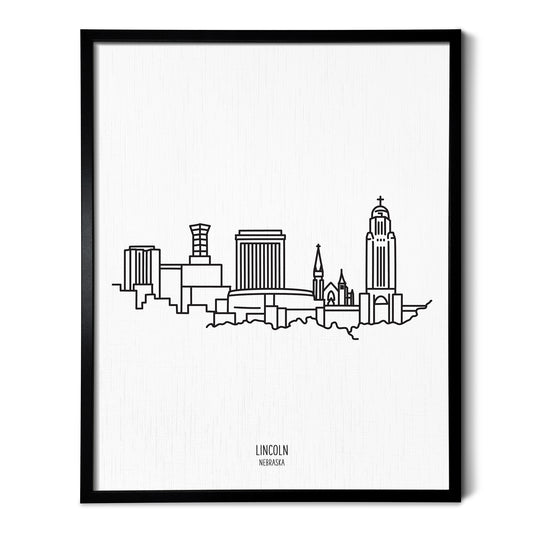 A line art drawing of the Lincoln Nebraska Skyline on white linen paper in a thin black picture frame