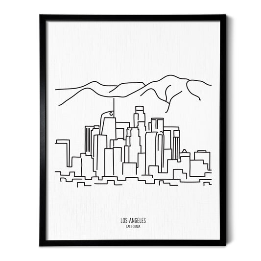 A line art drawing of the Los Angeles California Skyline on white linen paper in a thin black picture frame