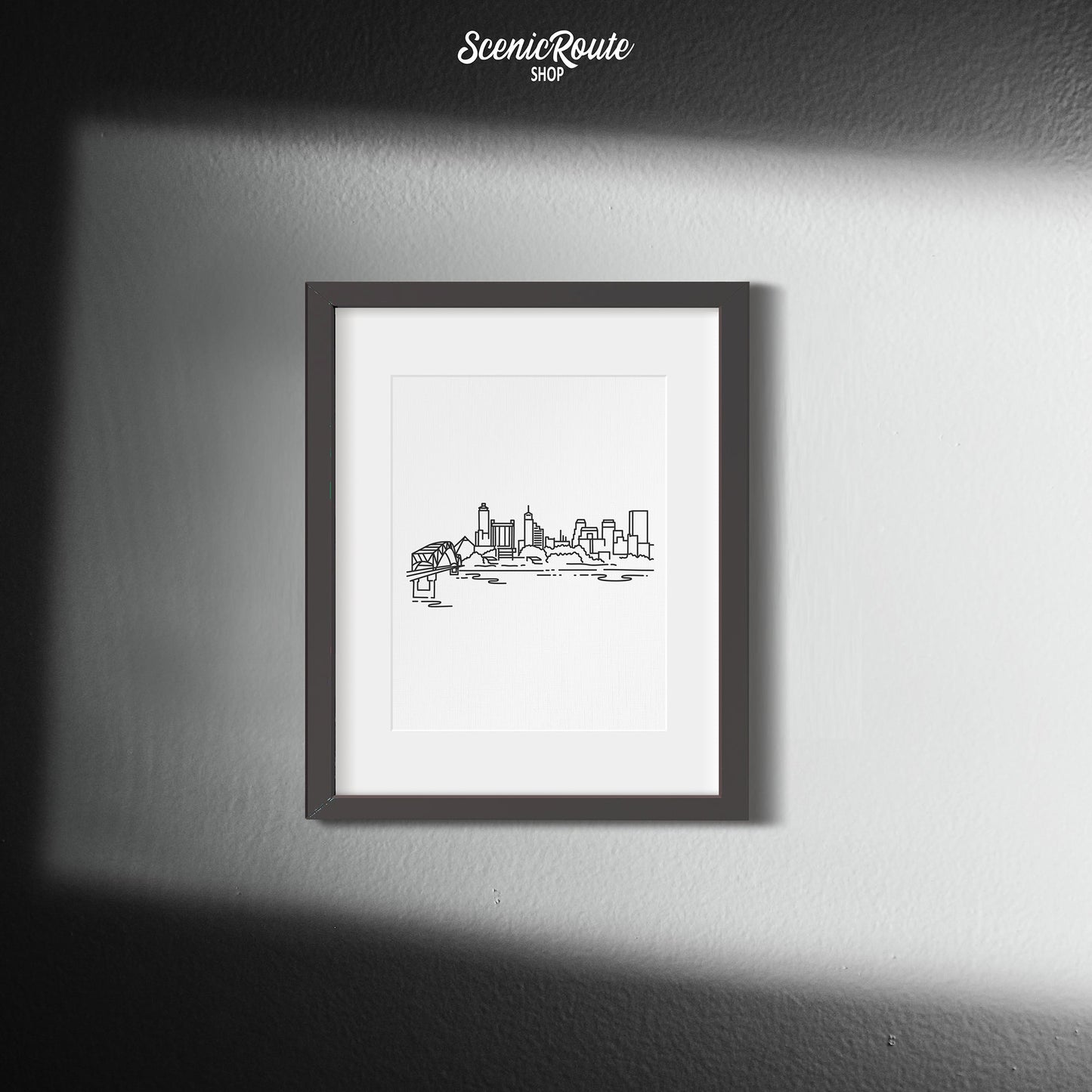 A framed line art drawing of the Memphis Skyline