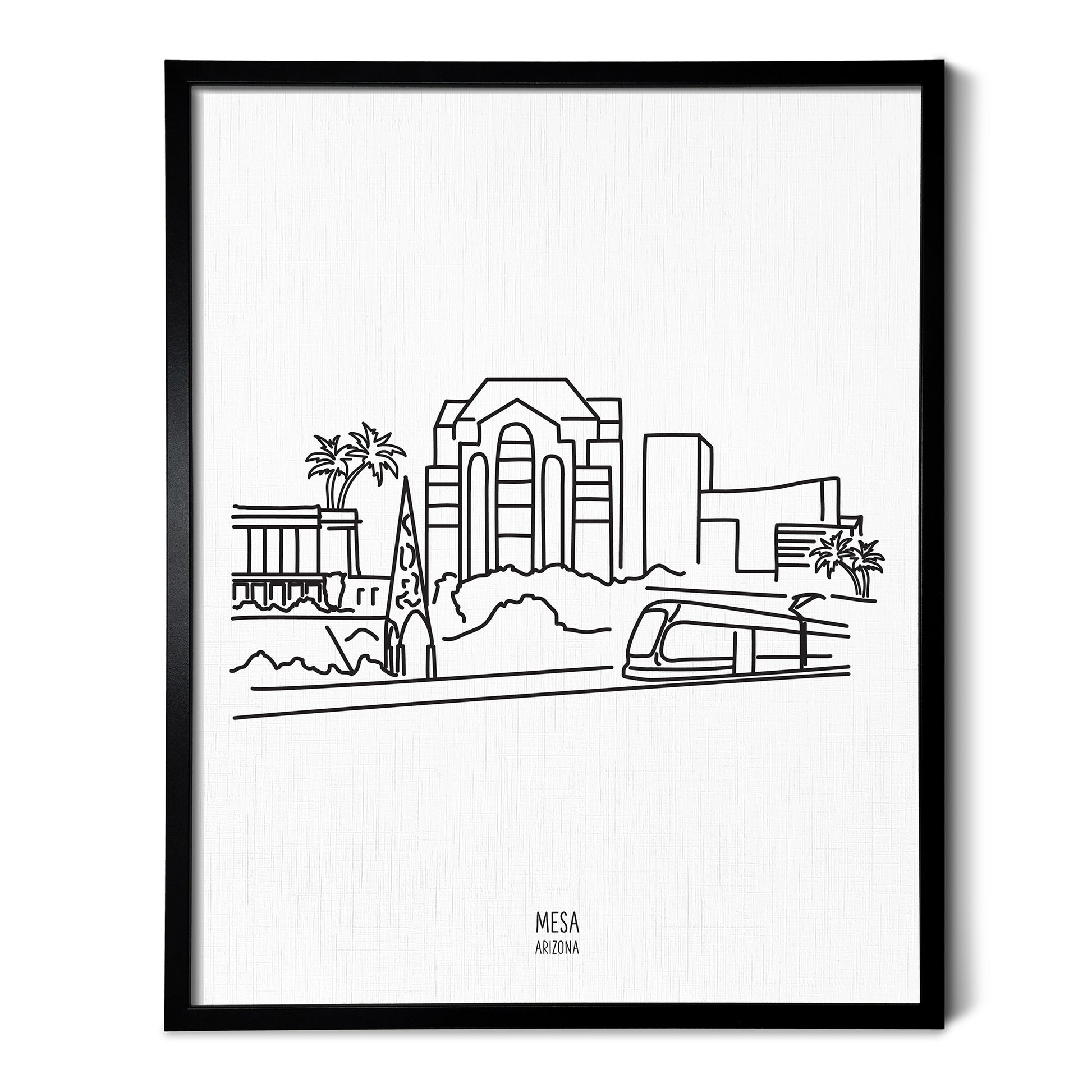 A line art drawing of the Mesa Arizona Skyline on white linen paper in a thin black picture frame