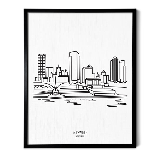 A line art drawing of the Milwaukee Wisconsin Skyline on white linen paper in a thin black picture frame
