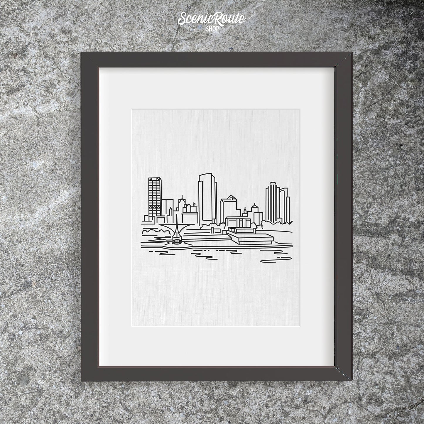 A framed line art drawing of the Milwaukee Skyline