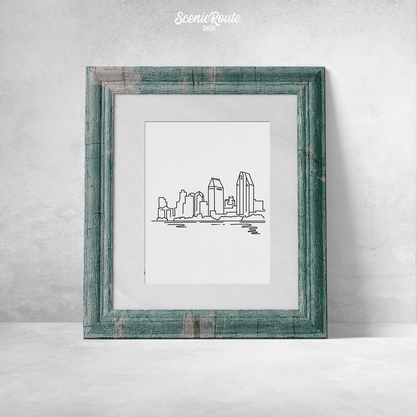 A framed line art drawing of the San Diego Skyline