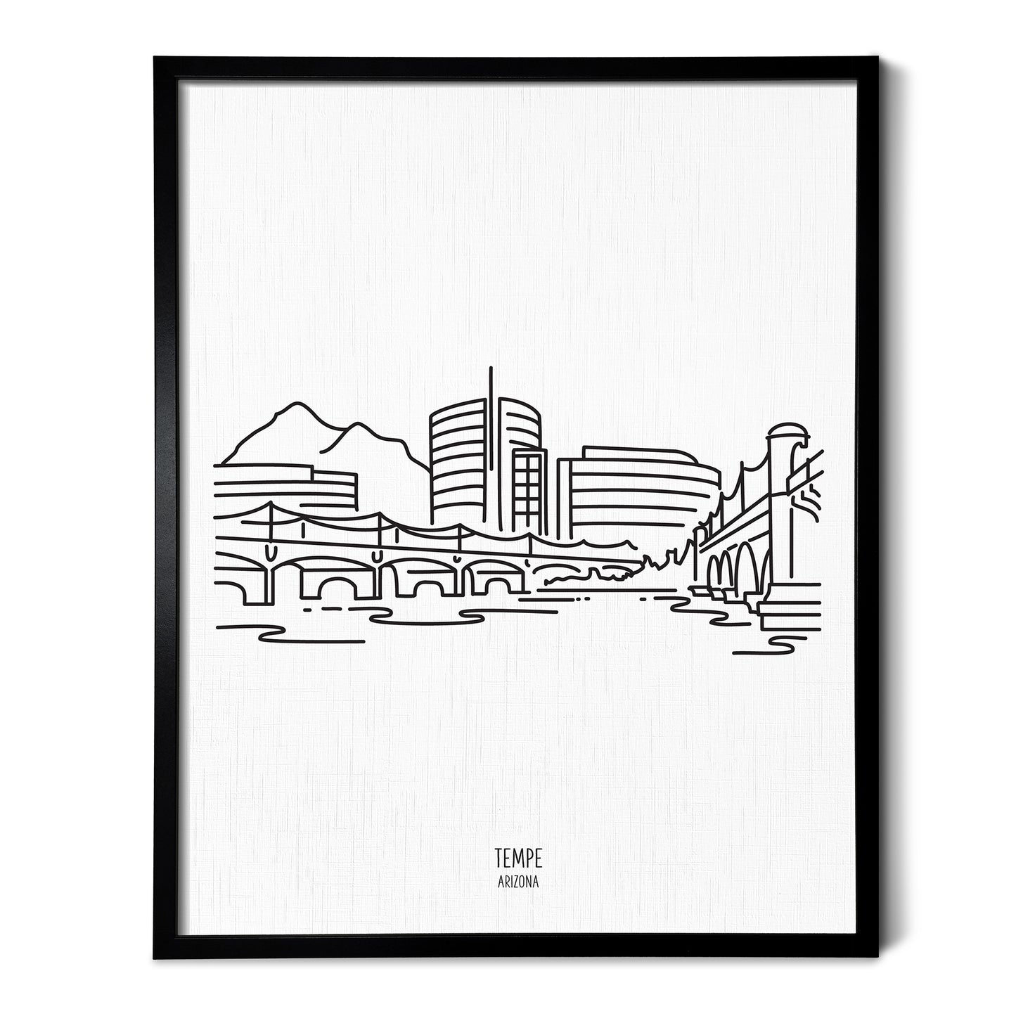 A line art drawing of the Tempe Arizona Skyline on white linen paper in a thin black picture frame