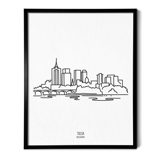 A line art drawing of the Tulsa Oklahoma Skyline on white linen paper in a thin black picture frame