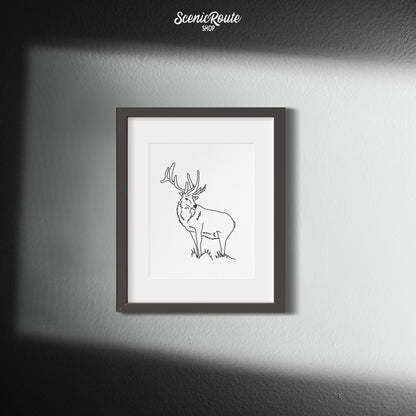 A framed line art drawing of an Elk